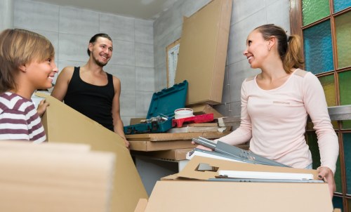 Moving boxes and van loading scene for complaint procedure introduction