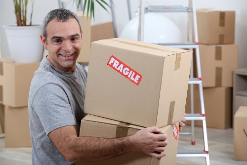 Furniture loading into a moving van in Harold Hill