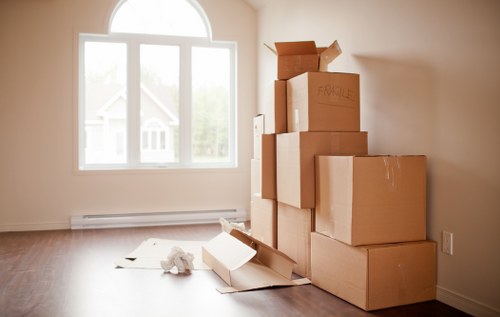Office move equipment and packed boxes ready for transport