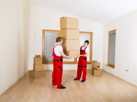 Removal van ready for loading in a Harold Hill street