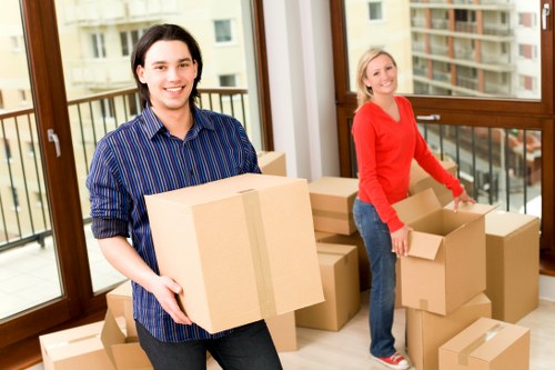 Prepared moving day with boxes and furniture for a Harold Hill removal